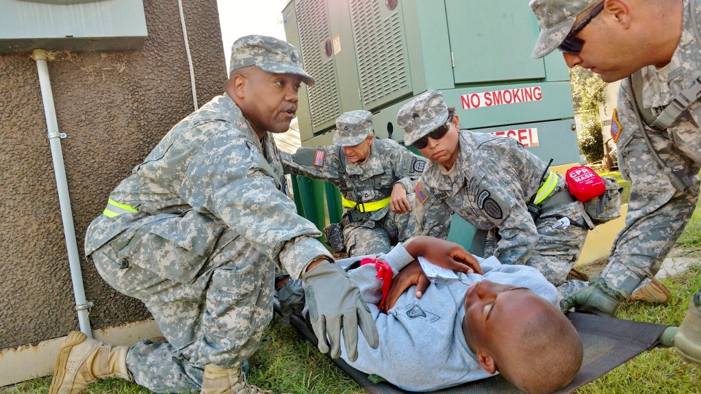 Georgia State Defense Force Soldiers render aid to a mock casualty during Annual Training at Fort Stewart, Georgia on October 1, 2016. (Georgia State Defense Force photo by Pfc. Alsdorf)