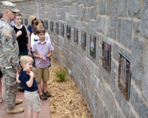 Visitors tour the Freedom Calls Memorial and read the names of the fallen. Photo by Master Sgt. Mark Woelzlein.