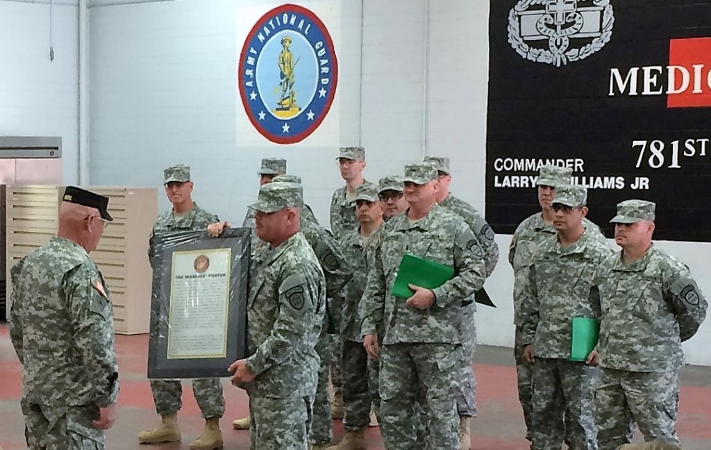 MARIETTA ARMORY, Marietta, Georgia, December 6, 2015 – The graduates of IET Charlie Class present Sgt. 1st Class Rodney Akers with a gift following graduation. It is customary for the graduating class to present a gift to the IET Cadre in recognition of their dedication and service. (Georgia State Defense Force photo by Pvt. Michael Chapman, Public Affairs Office)