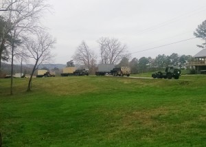 M1088 trucks moving heavy loads during OPB15.