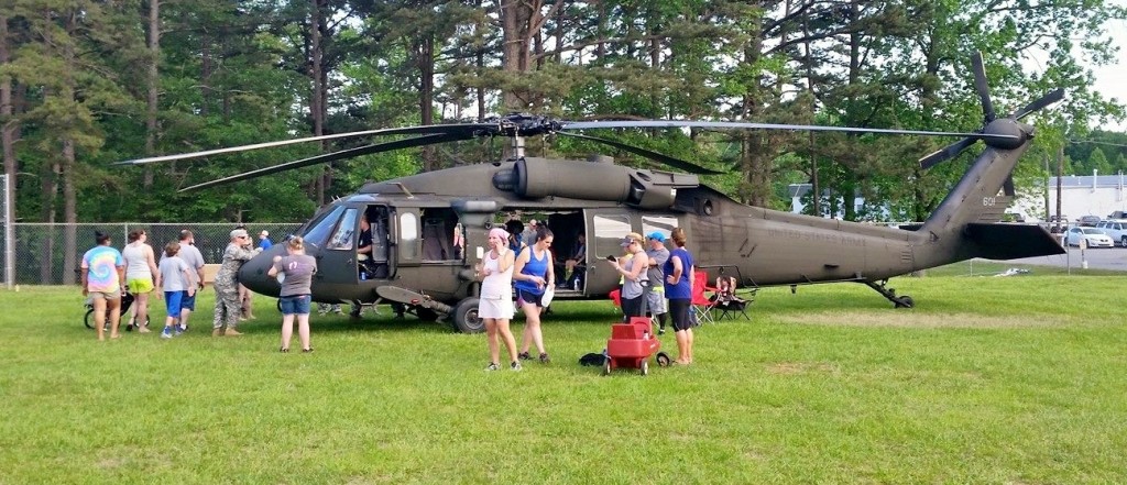 A U.S. Army UH-60 Black Hawk helicopter on display at the event.