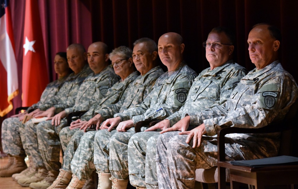 Brig. Gen. Danielson, right, and guests listen to a speaker during the Officer Candidate/Warrant Officer School graduation ceremony at the Georgia Public Safety Training Center in Forsyth, Georgia on August 14, 2016. (Georgia State Defense Force photo by Pfc. Davidson)