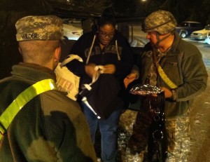 CPT Don Lankford and National Guard soldier Wilder assisting citizens during the operation.