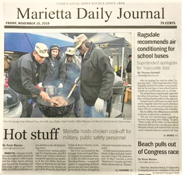 GSDF cook off team members are featured on the front page of the Marietta Daily Journal.