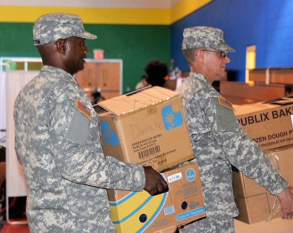 Members of the Georgia State Defense Force move supplies at the Hephzibah Children’s Home in Macon, Georgia during the response to Hurricane Matthew on October 8, 2016.  (Georgia State Defense Force photo by Sgt. 1st Class Alasa)
