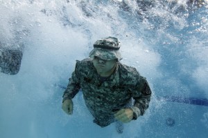 GSDF SGT Roger Boles of 1BDE / 3BN completes one of the many skill exercises required as part of the water survival training program.